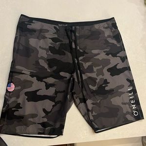 Dark Camo O’Neil Hyper Freak board shorts.  38 inch waist and 21 inch inseam